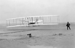 First flight of the Wright 1903 Flyer.